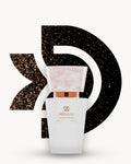 Chogan 055 Extrait de Parfum, weisser Parfumflakon mit rosa marmorierter Verschlusskappe und kupferfarbenem Akzent, mittig vor schwarzem D-förmigem Hintergrund mit funkelnden goldbraunen Lichtreflexen, Duftfamilie ähnlich Black Opium.
